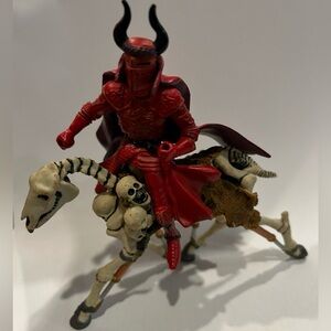 Red Armored Knight on Skeleton Horse Figurine